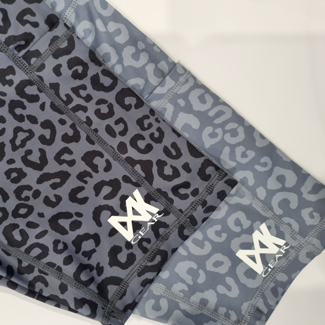 Flat lay of IX Gear Gym Shorts. Top: Dark Grey and Bottom: Light Grey. Plain white background.